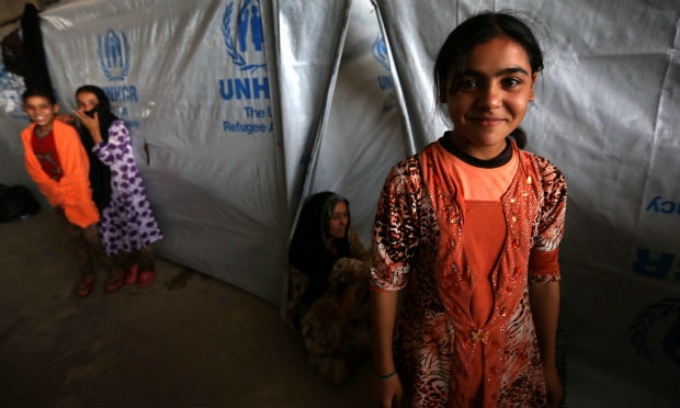 Crianças iraquianas em acampamento de refugiados no Curdistão.  / Foto: AFP