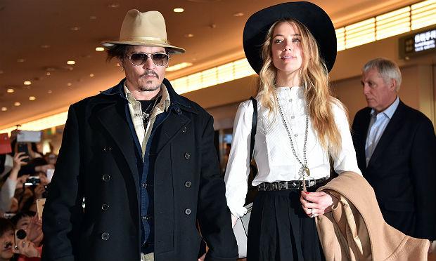 Johnny Depp e sua mulher levaram seus cachorros à Austrália durante a filmagem de "Piratas do Caribe" / Foto: AFP