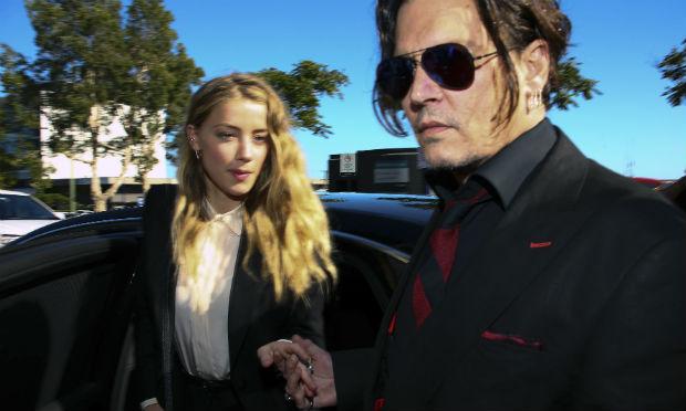 Atores Johnny Depp e Amber Heard fecham acordo de divórcio