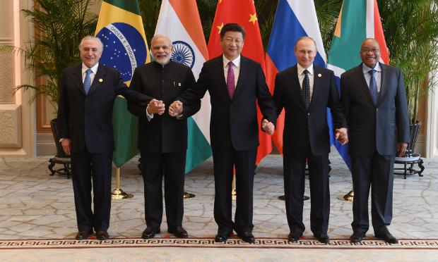 Sobre os BRICS, Temer falou rapidamente que os países do grupo "são forças positivas" para estabilidade econômica global. / Foto: AFP.