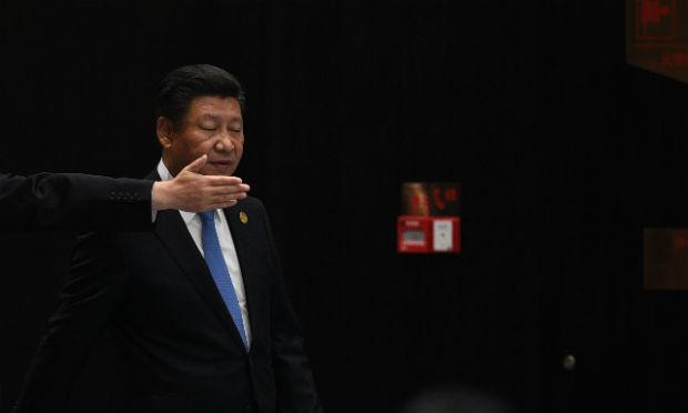 "Decidimos apoiar um sistema comercial multilateral e nos opor ao protecionismo", declarou o presidente chinês, Xi Jinping. / Foto: Johannes Eisele / AFP