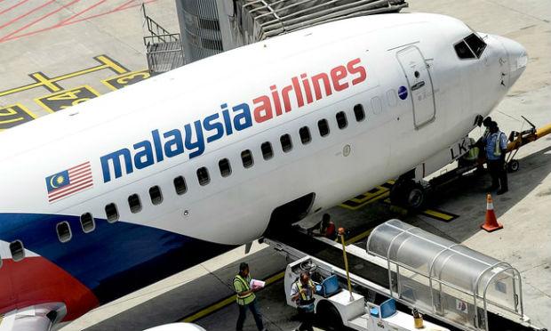 Investigações sobre queda de avião da Malaysia Airlines / Foto: AFP