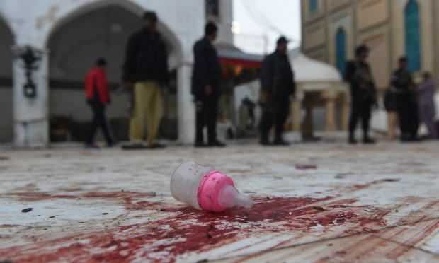 Vinte crianças podem estar entre as vítimas do atentado, considerado o mais sangrento no Paquistão desde o início do ano. / Foto: ASIF HASSAN / AFP