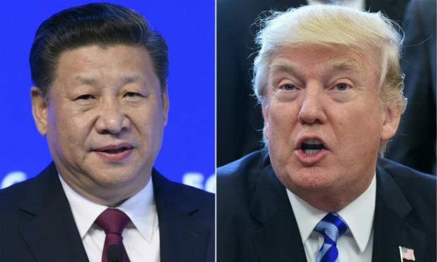 O presidente chinês será o segundo governante estrangeiro recebido por Trump , desde que ele tomou posse, em janeiro. / Foto: MANDEL NGAN, FABRICE COFFRINI / AFP